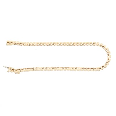 Lot 152 - An 18ct gold diamond line bracelet