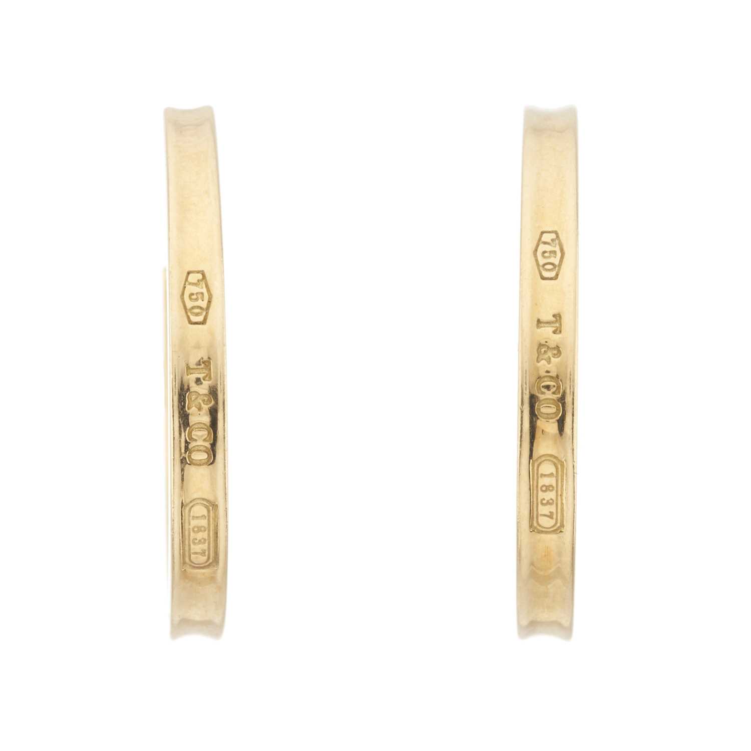 Lot 71 - Tiffany & Co., a pair of 18ct gold 1837 Narrow hoop earrings