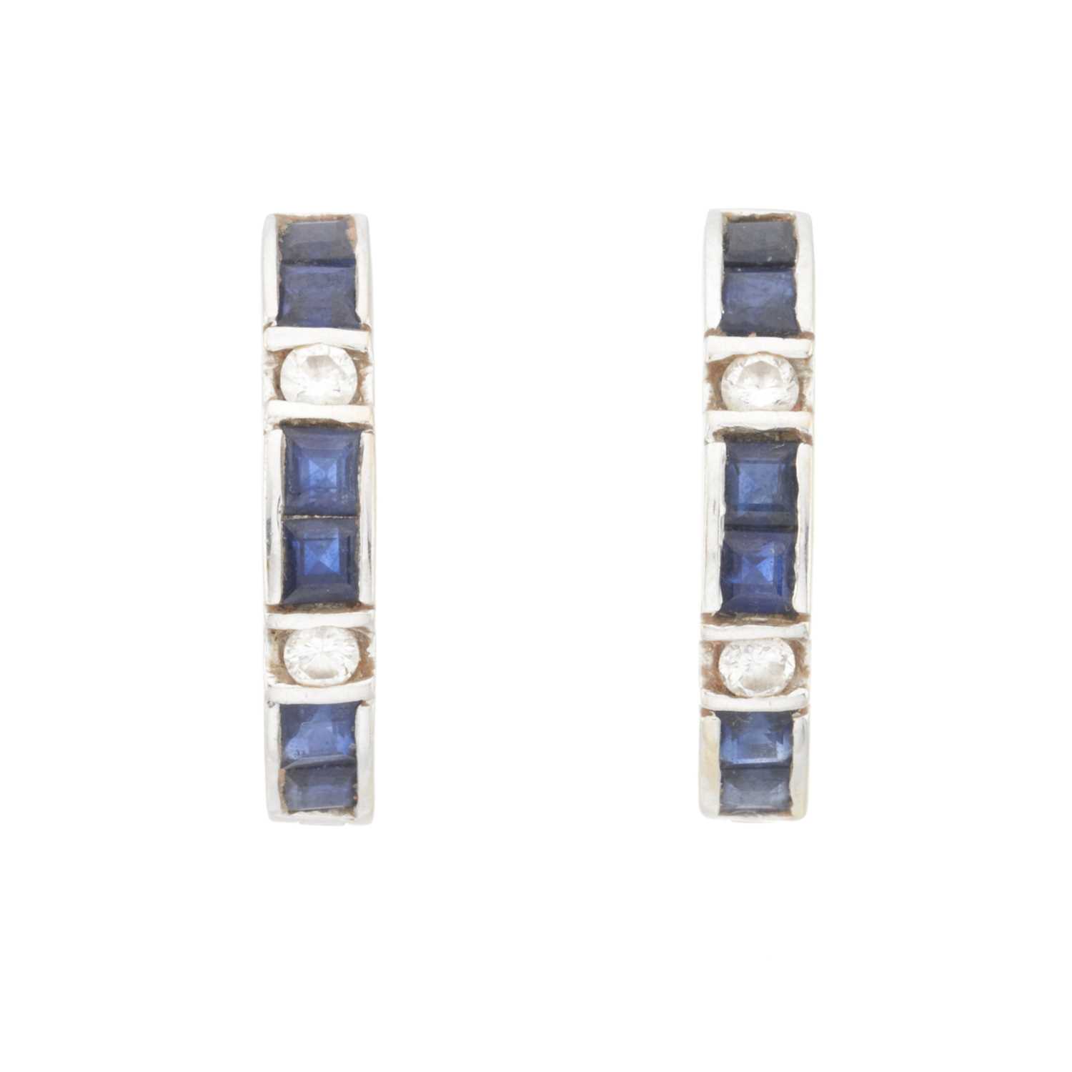 Lot 166 - A pair of 18ct gold sapphire and diamond hoop earrings