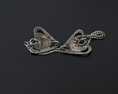 Lot 24 - An Arts & Crafts silver and enamel cloak clasp