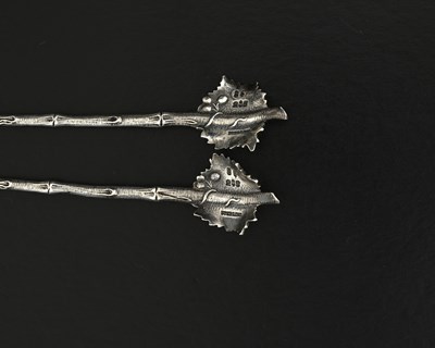 Lot 79 - A pair of American sterling silver Aesthetic...