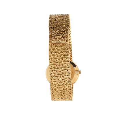 Lot 226 - Piaget, a 1970s 18ct gold bracelet watch,...