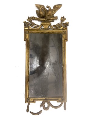 Lot 235 - A Regency carved gilt wood pier glass, circa...