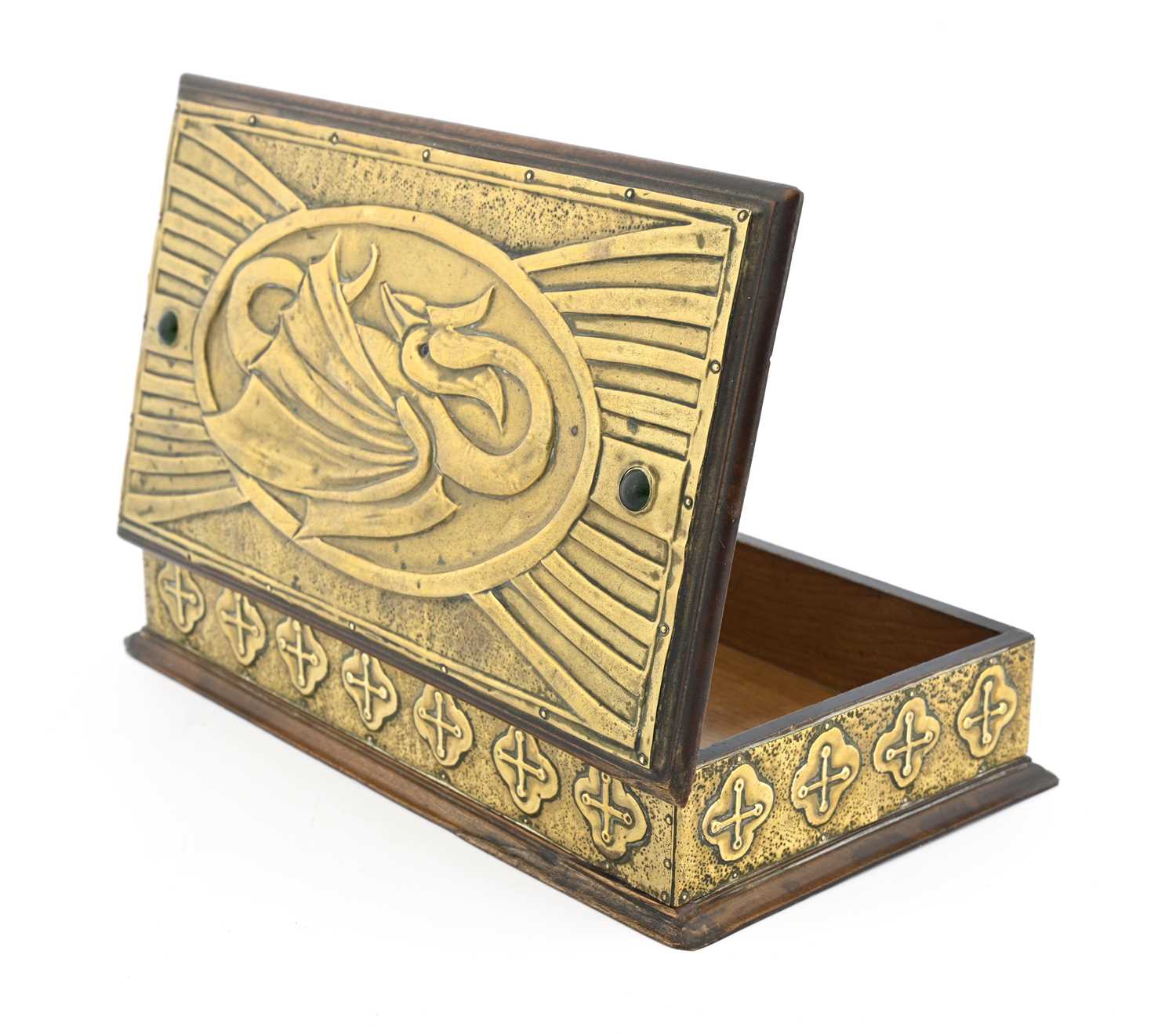 Lot 175 - An Arts and Crafts brass clad box, the lid...