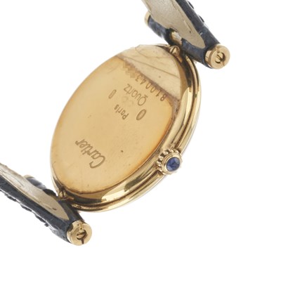 Lot 226 - Cartier, a tri-metal Vendome Trinity wrist watch