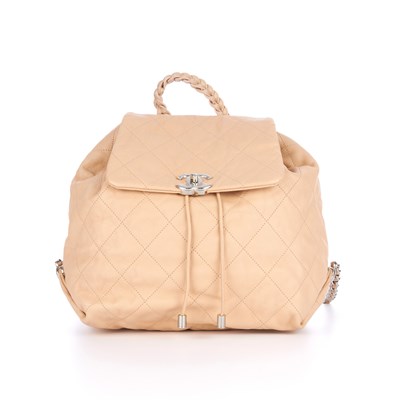 Lot 281 - Chanel, a quilted backpack, crafted from nude...