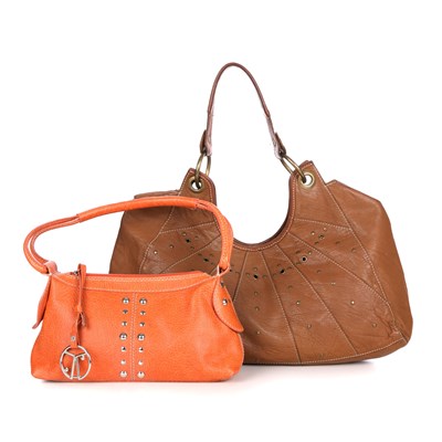 Lot 304 - Coccinelle, two leather handbags, to include a...