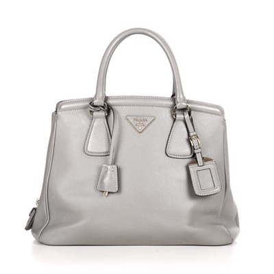 Lot 350 - Prada, a grey Saffiano handbag, crafted from...