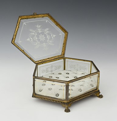 Lot 228 - A French gilt metal and enamelled glass jewel...