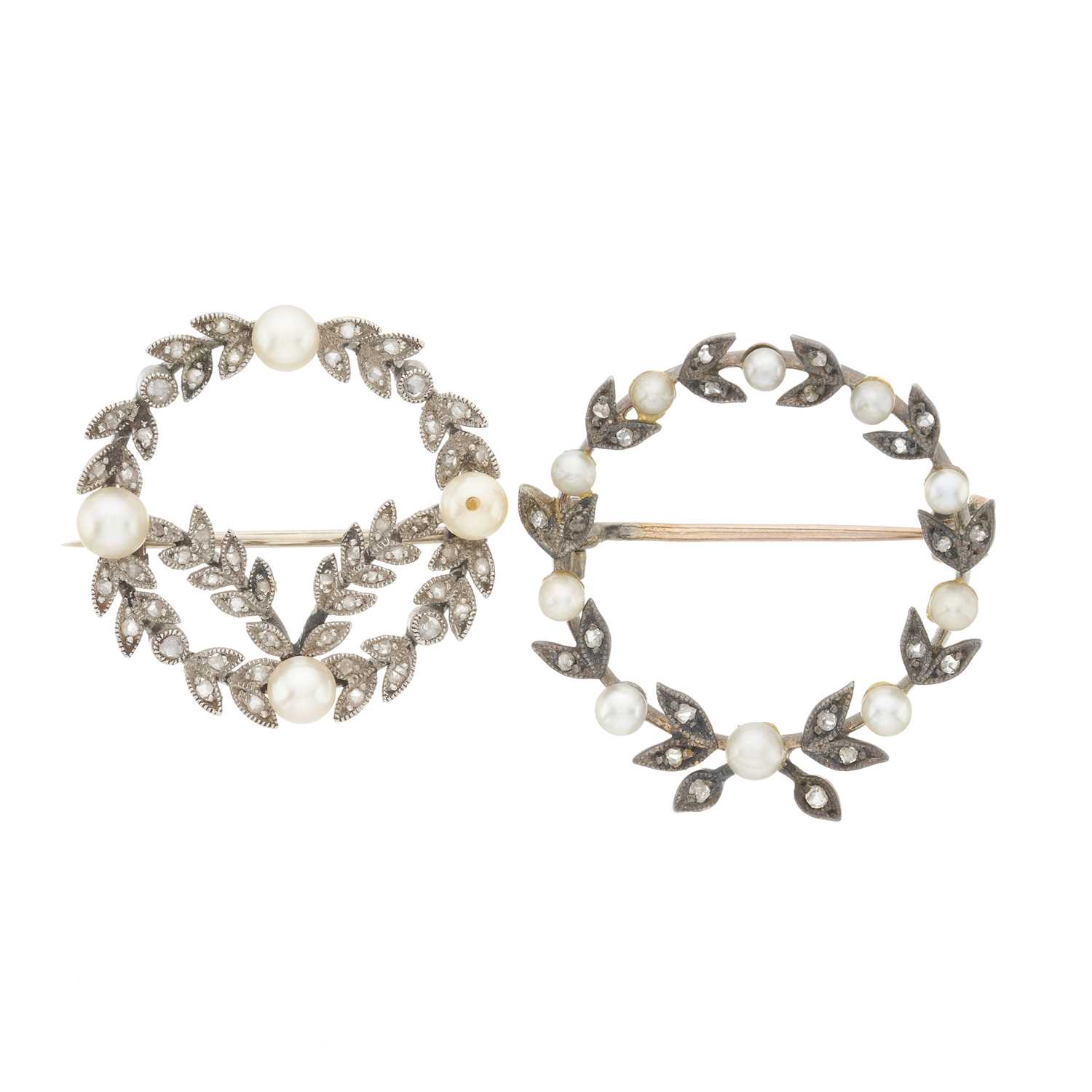 Lot 185 - Two Edwardian pearl and diamond wreath brooches