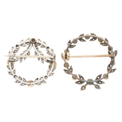 Lot 185 - Two Edwardian pearl and diamond wreath brooches