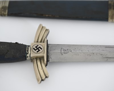 Lot 259 - A German Third Reich NSFK dagger and scabbard...