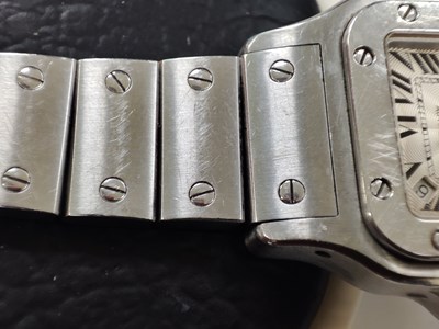 Lot 221 - Cartier, a stainless steel Santos Galbée bracelet watch