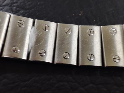 Lot 221 - Cartier, a stainless steel Santos Galbée bracelet watch