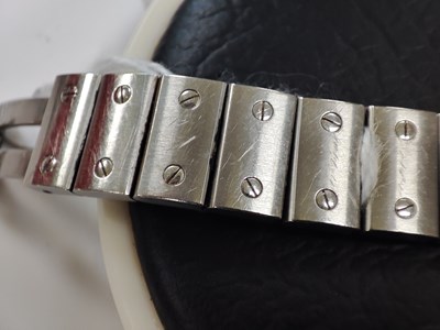 Lot 221 - Cartier, a stainless steel Santos Galbée bracelet watch