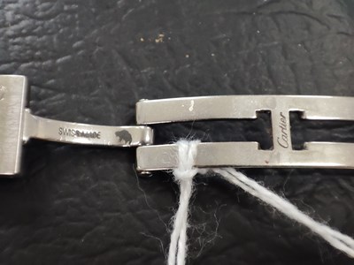 Lot 221 - Cartier, a stainless steel Santos Galbée bracelet watch