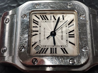 Lot 221 - Cartier, a stainless steel Santos Galbée bracelet watch