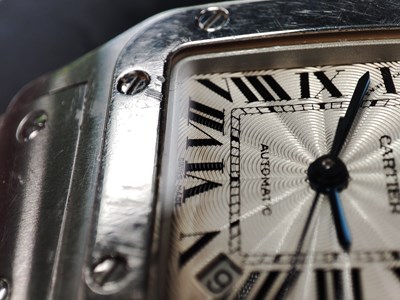 Lot 221 - Cartier, a stainless steel Santos Galbée bracelet watch
