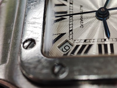 Lot 221 - Cartier, a stainless steel Santos Galbée bracelet watch