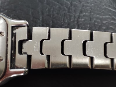 Lot 221 - Cartier, a stainless steel Santos Galbée bracelet watch