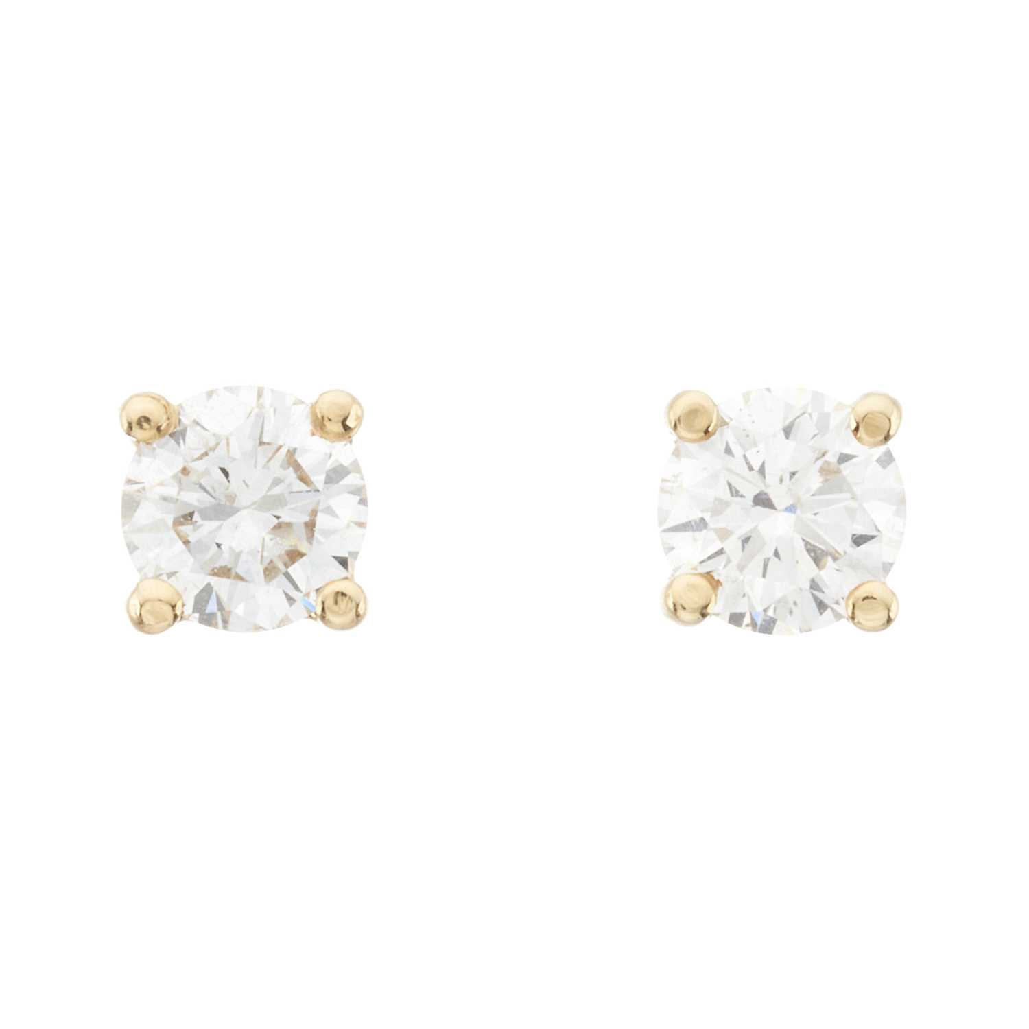 Lot 40 - A pair of 18ct gold brilliant-cut diamond single-stone stud earrings