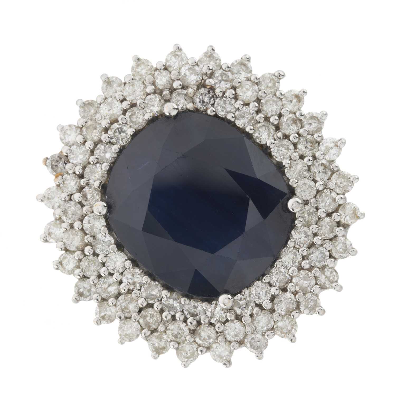Lot 175 - An 18ct gold sapphire and diamond cluster dress ring