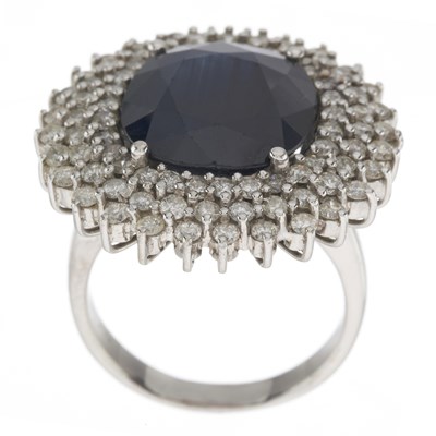 Lot 175 - An 18ct gold sapphire and diamond cluster dress ring