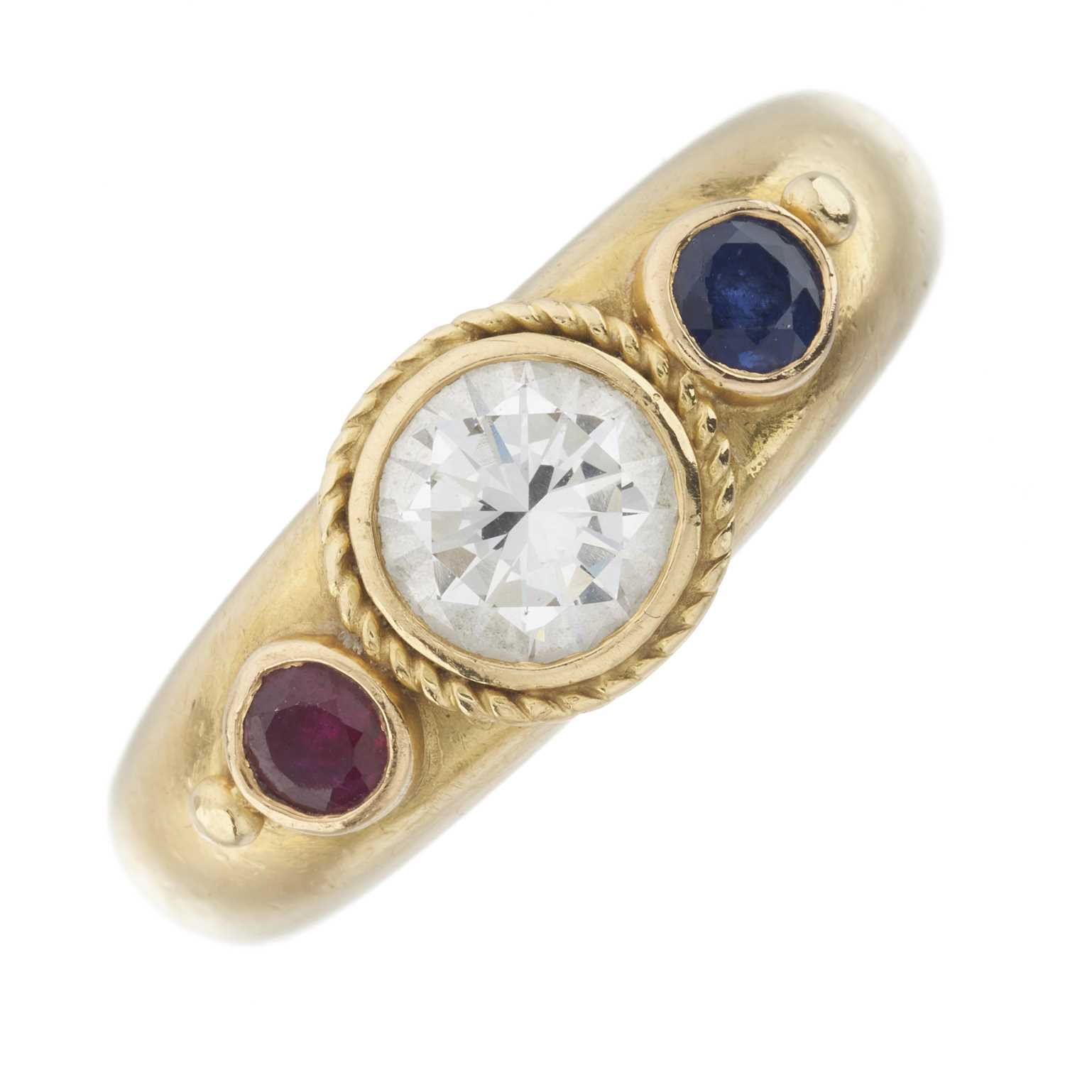 Lot 127 - Boodles & Dunthorne, an 18ct gold diamond, ruby and sapphire band ring