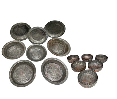 Lot 201 - Eight hammered tinned copper bowls, likely...