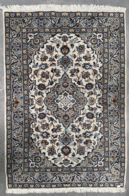 Lot 506 - Modern Iranian rug, with central floral...