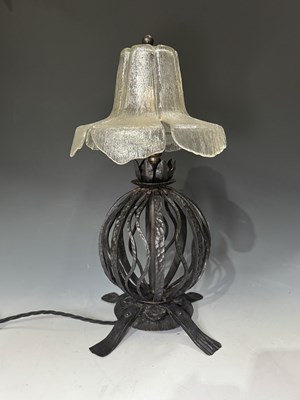 Lot 612 - An English Arts & Crafts style wrought iron...