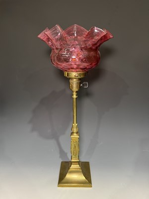 Lot 640 - A brass table lamp, early 20th century,...
