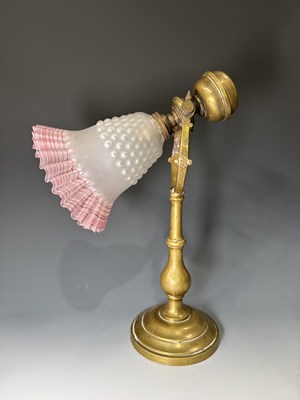 Lot 626 - A French brass swing table lamp, 1920s,...