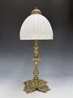 Lot 546 - An English brass table lamp, 1930s, with white...