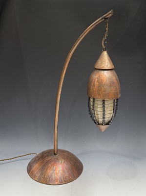 Lot 519 - A vintage copper table lamp, 1970s, the light...