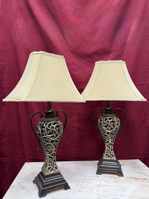 Lot 548 - A pair of modern composite table lamps, in...