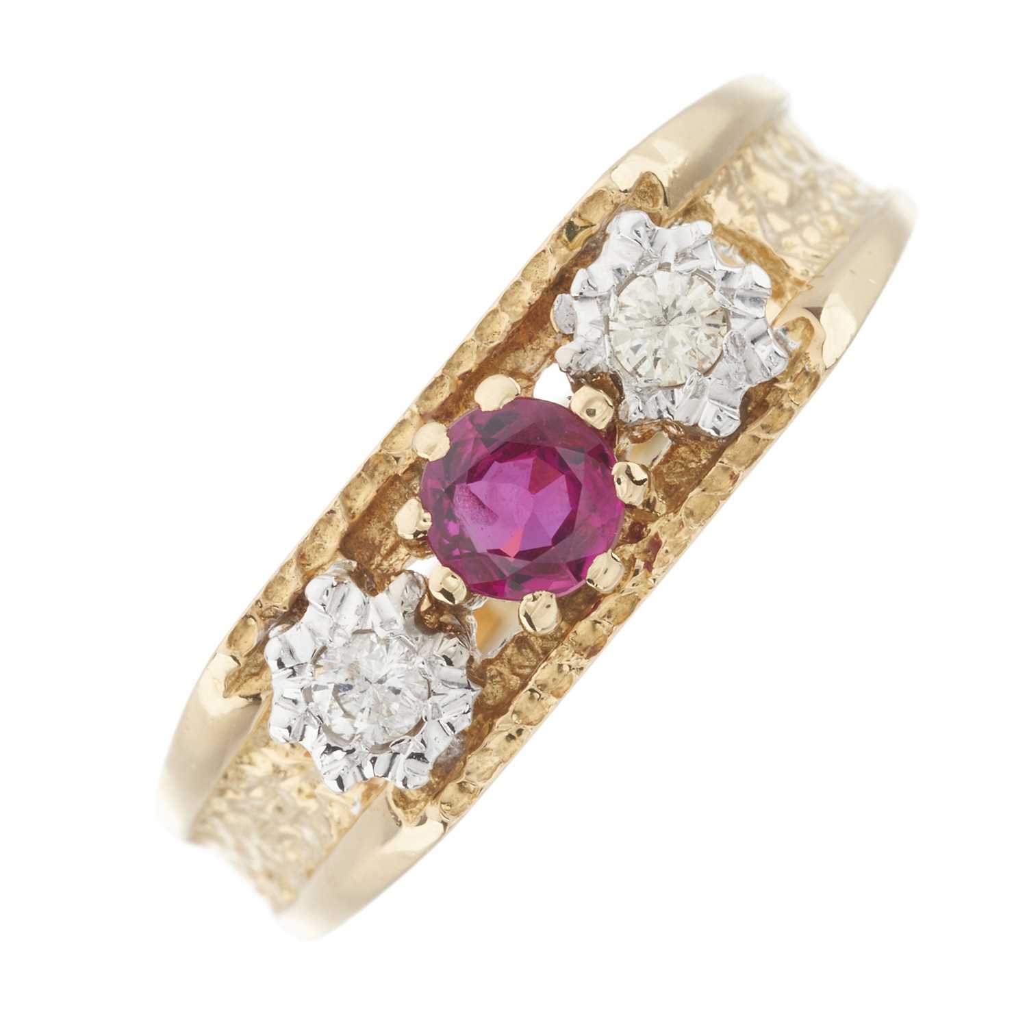 Lot 216 - A 1970s 18ct gold ruby and diamond three-stone ring