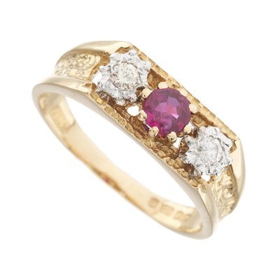 Lot 216 - A 1970s 18ct gold ruby and diamond three-stone ring