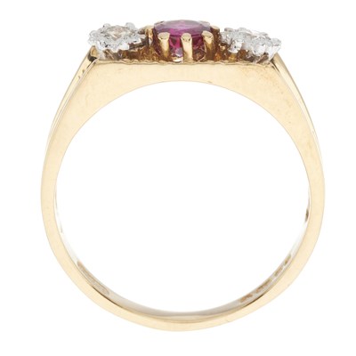 Lot 216 - A 1970s 18ct gold ruby and diamond three-stone ring