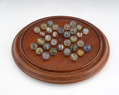 Lot 184 - A collection of 32 Victorian glass marbles on...