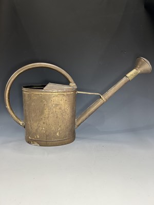 Lot 195 - A vintage weathered brass watering can, P P....