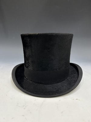 Lot 15 - Tress & Co London, a black silk top hat, in...