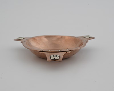 Lot 183 - A E Jones, an Arts and Crafts silver and...