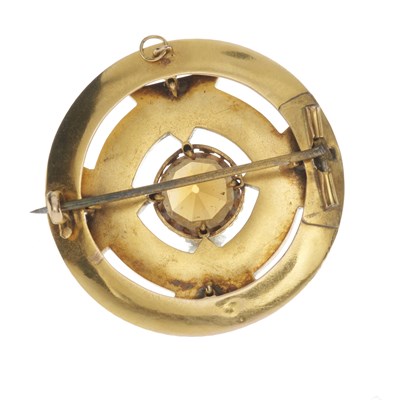 Lot 10 - A mid Victorian gold white enamel citrine target brooch