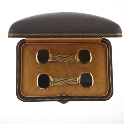 Lot 74 - Emil Meister, Zurich, a pair of 18ct gold onyx Around the Cuff cufflinks