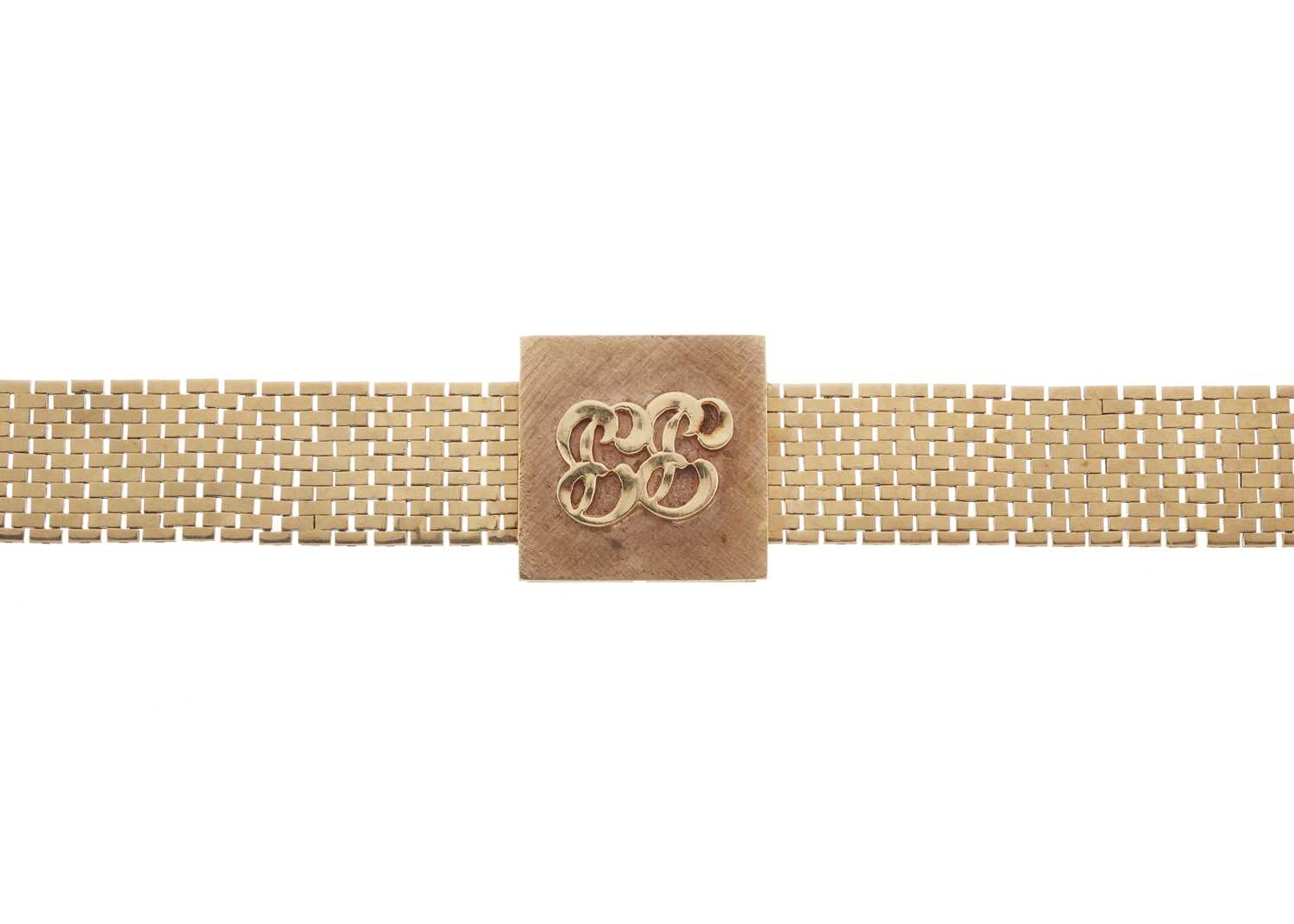 Lot 25 - An 18ct gold bracelet, with 14ct gold central panel