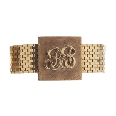 Lot 25 - An 18ct gold bracelet, with 14ct gold central panel
