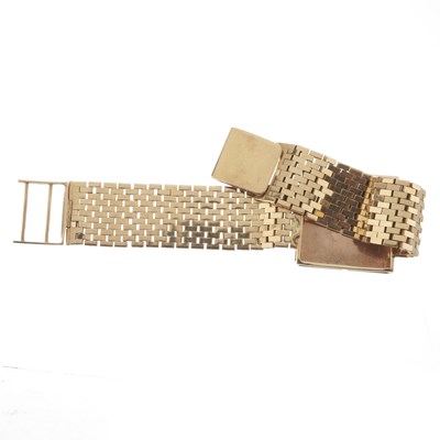 Lot 25 - An 18ct gold bracelet, with 14ct gold central panel