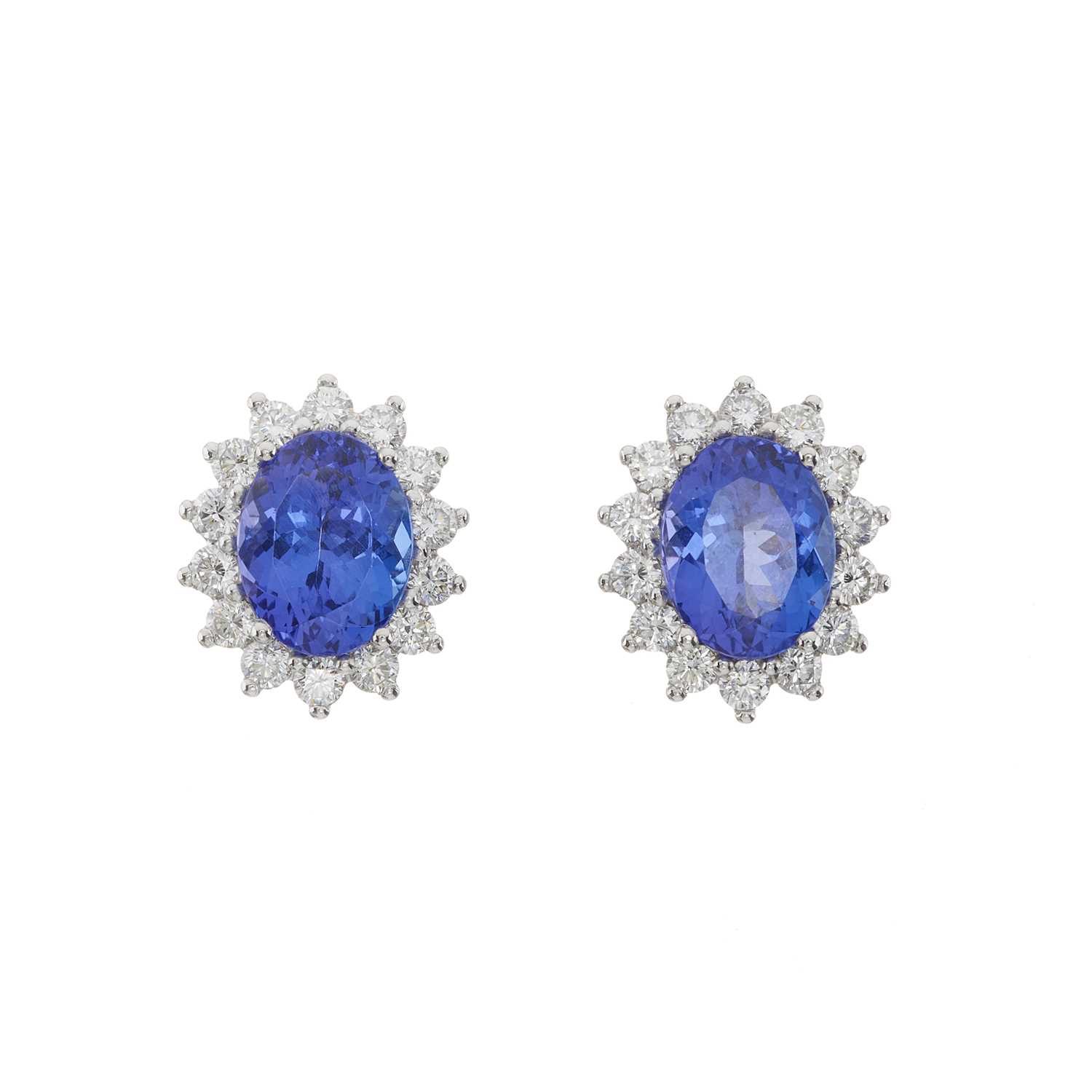 Lot 60 - A pair of 18ct gold tanzanite and diamond cluster stud earrings