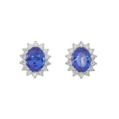 Lot 60 - A pair of 18ct gold tanzanite and diamond cluster stud earrings